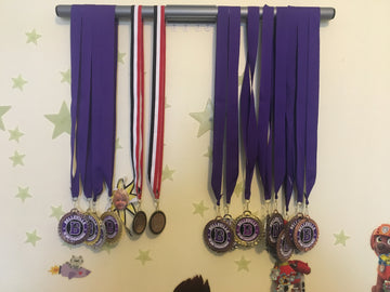 The Best Ways to Display Kids' Medals: Spotlight on Jersey Mount and Medal Mount from Sport Displays